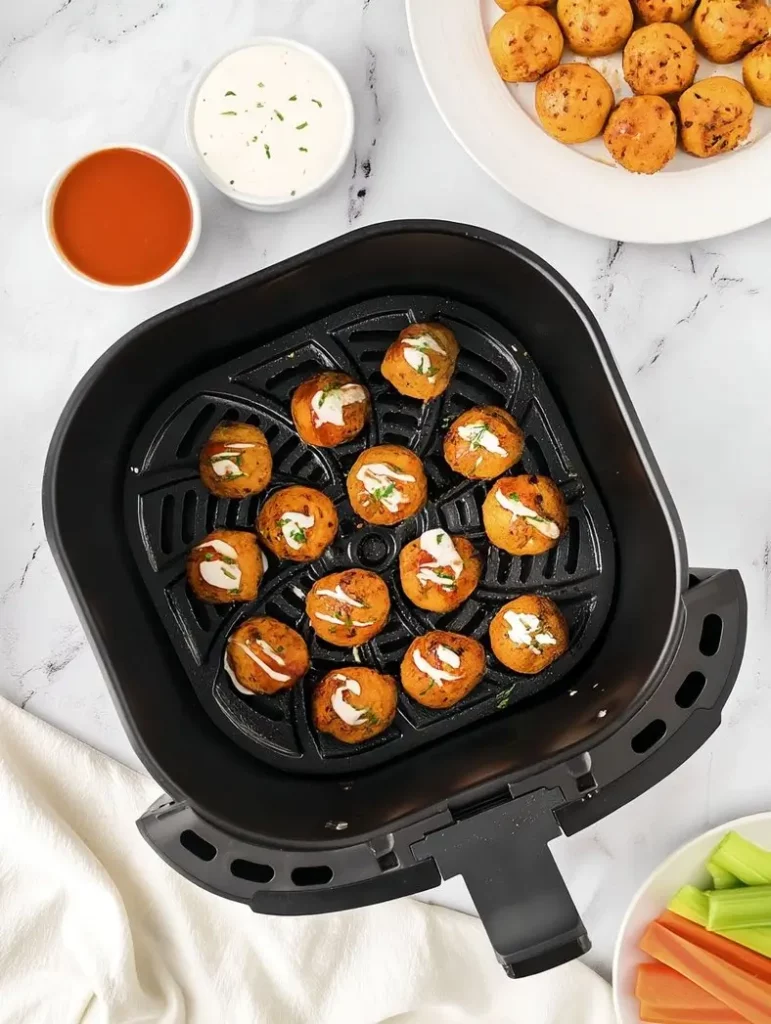 Raw buffalo chicken meatballs ready for the air fryer