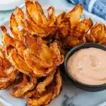 blooming onion air fryer served with dip